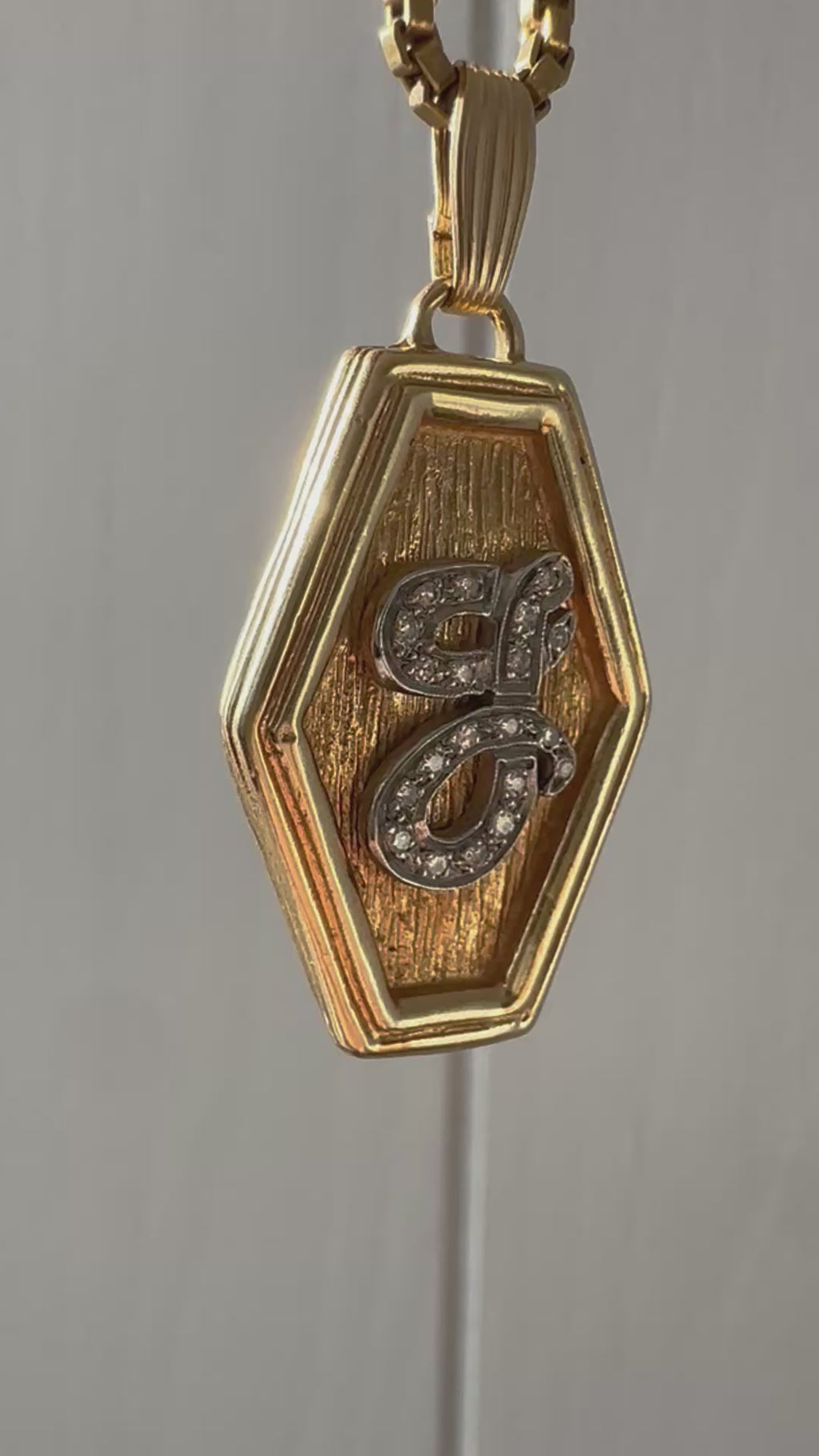 diamond J pendant