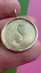 S medallion