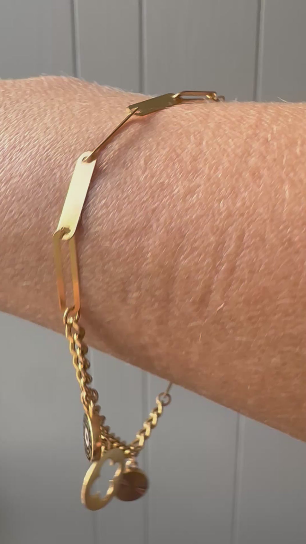 21k gold paperlink and curb charm bracelet
