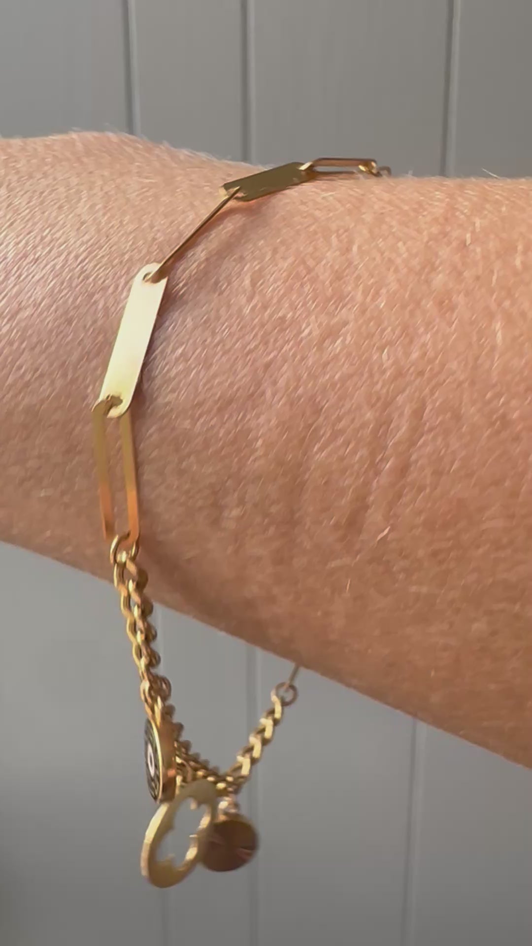 21k gold paperlink and curb charm bracelet