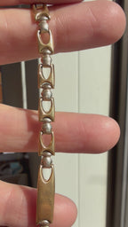 two tone buckle link bracelet with small ID bar