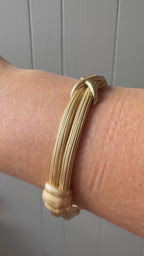 mesh bracelet with x and bar stations