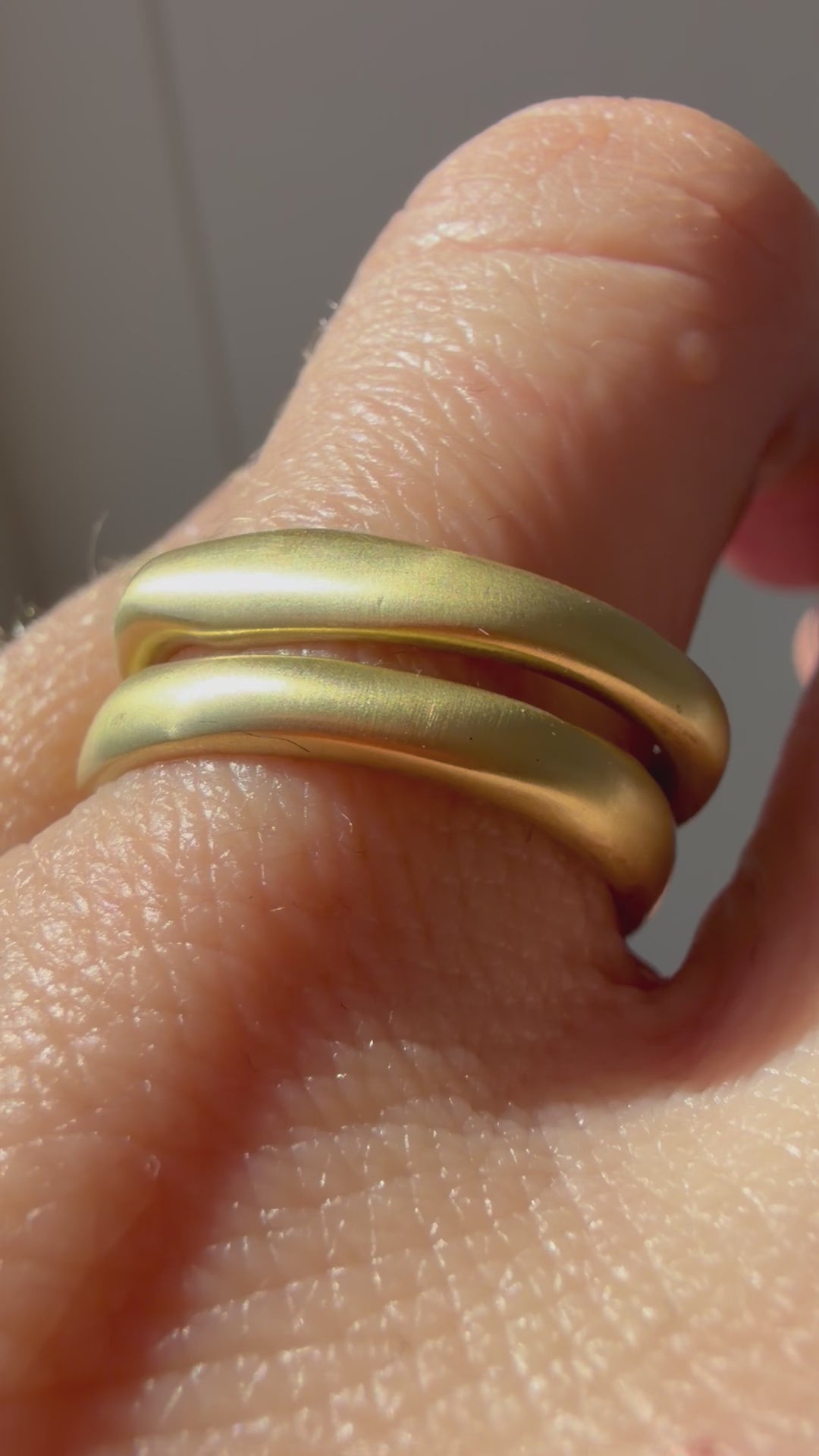 pair of 18k matte gold finish bands