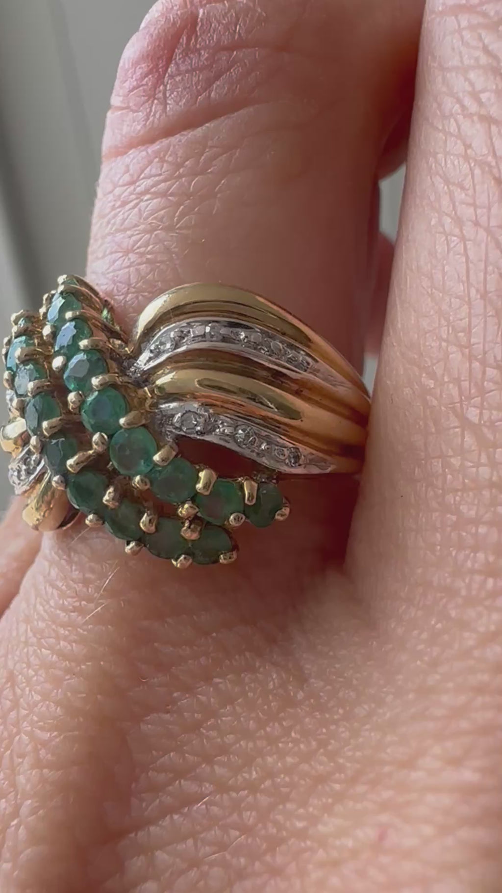 emerald and diamond swoop ring