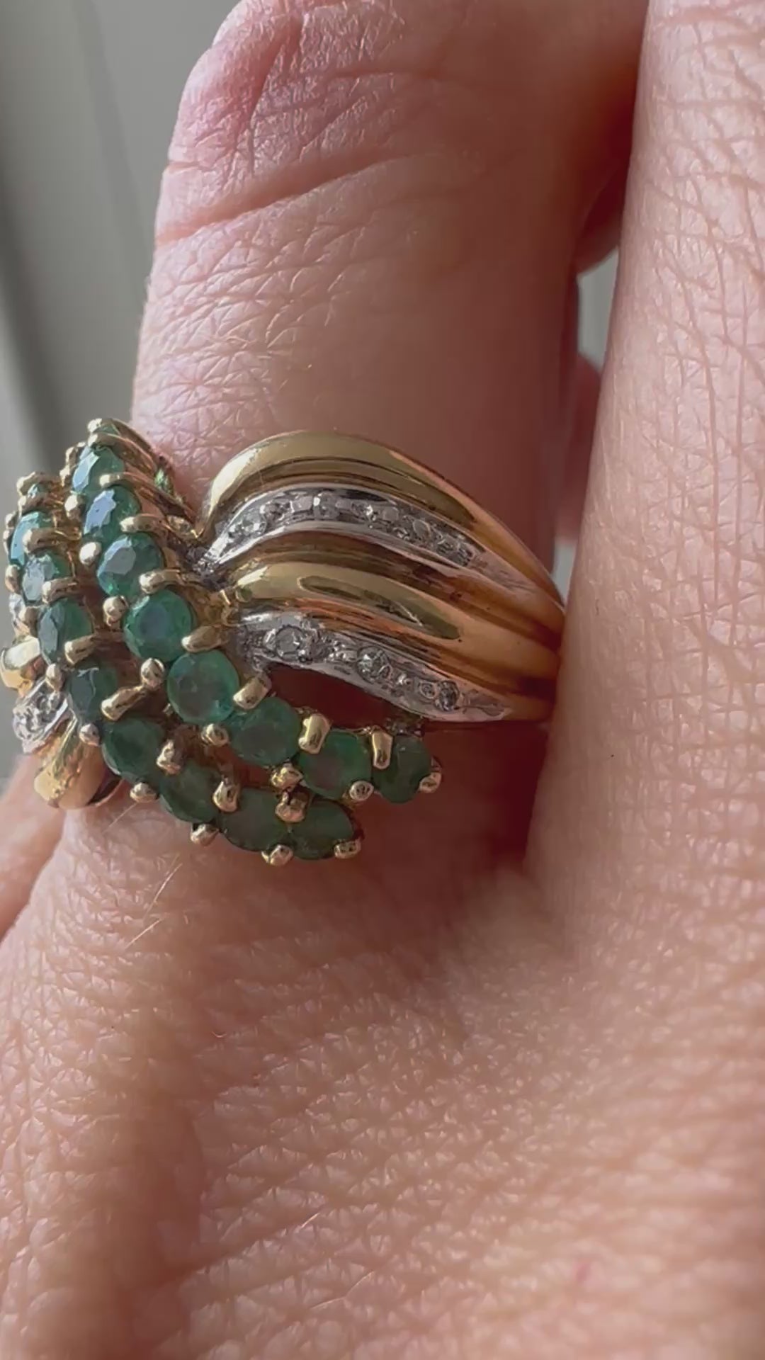 emerald and diamond swoop ring