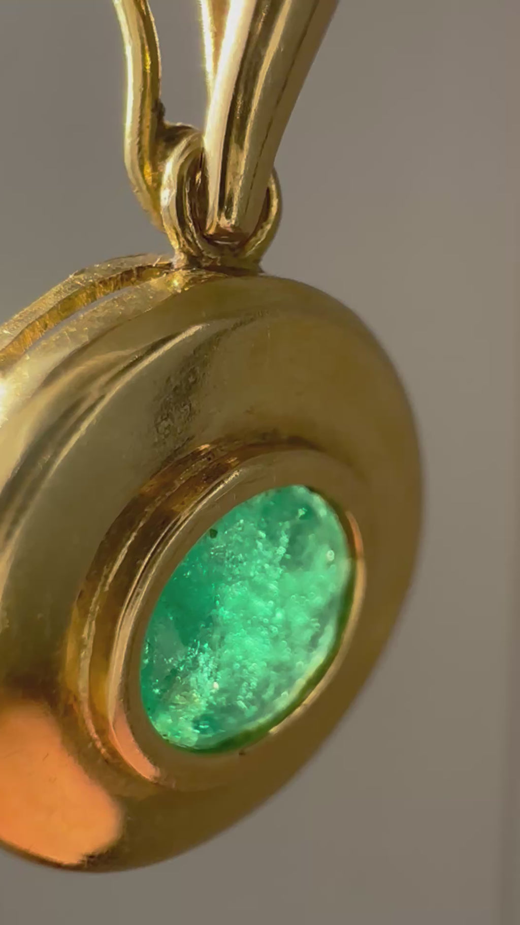 emerald in 18k bezel