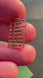 articulated abacus charm