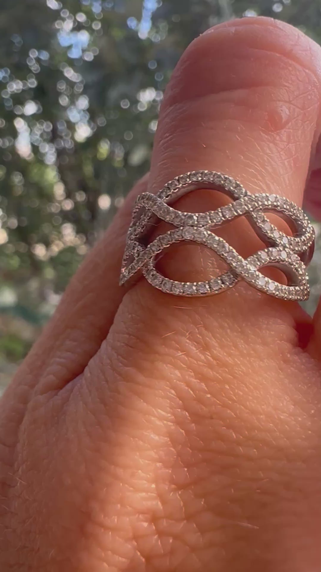 Double infinity diamond ring