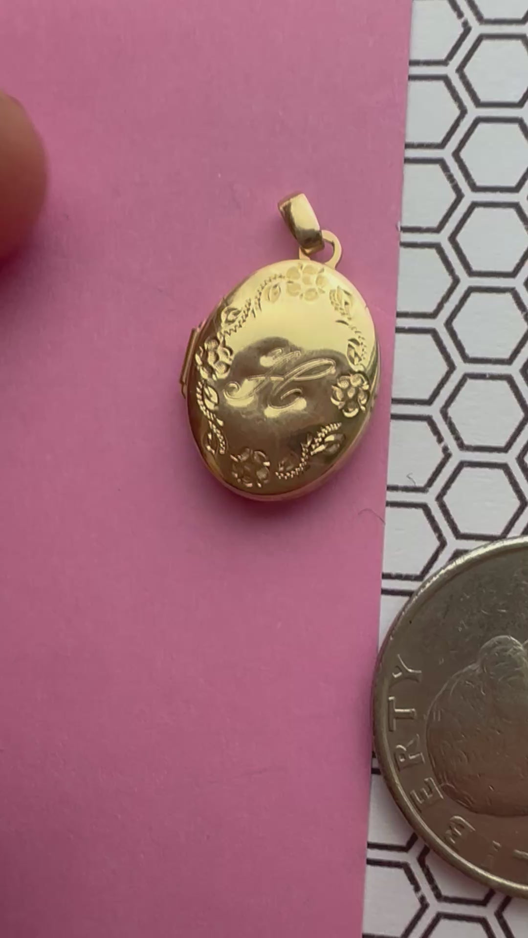 oval floral locket engraved H