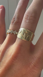 tapered band with leaves and satin finish