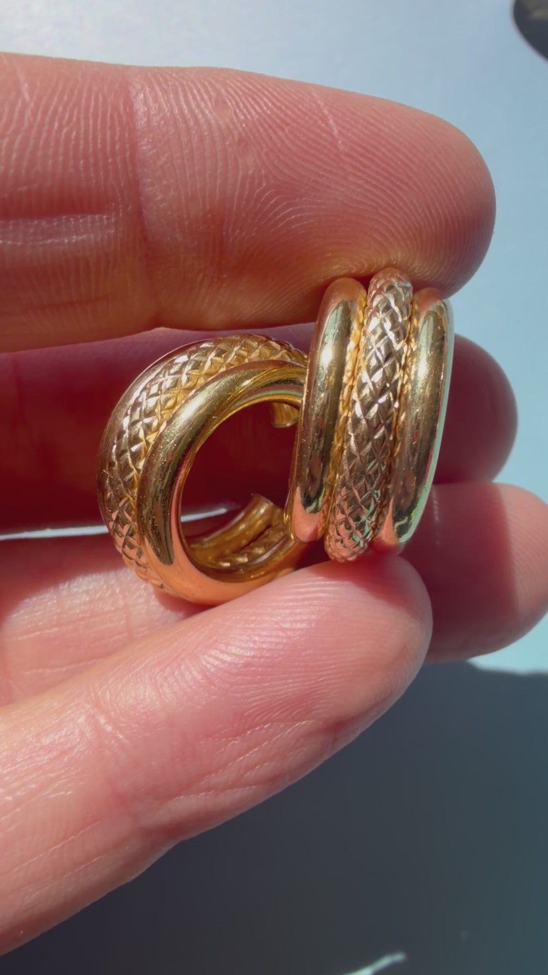 chubby 18k gold hoop with crosshatch pattern