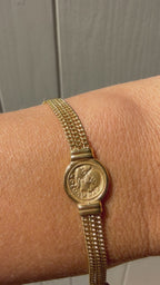double sided coin and curb chain bracelet