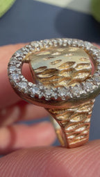 diamond oval and gold textured ring