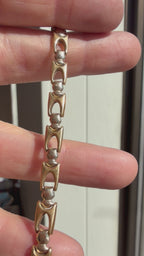 two tone buckle link bracelet with small ID bar