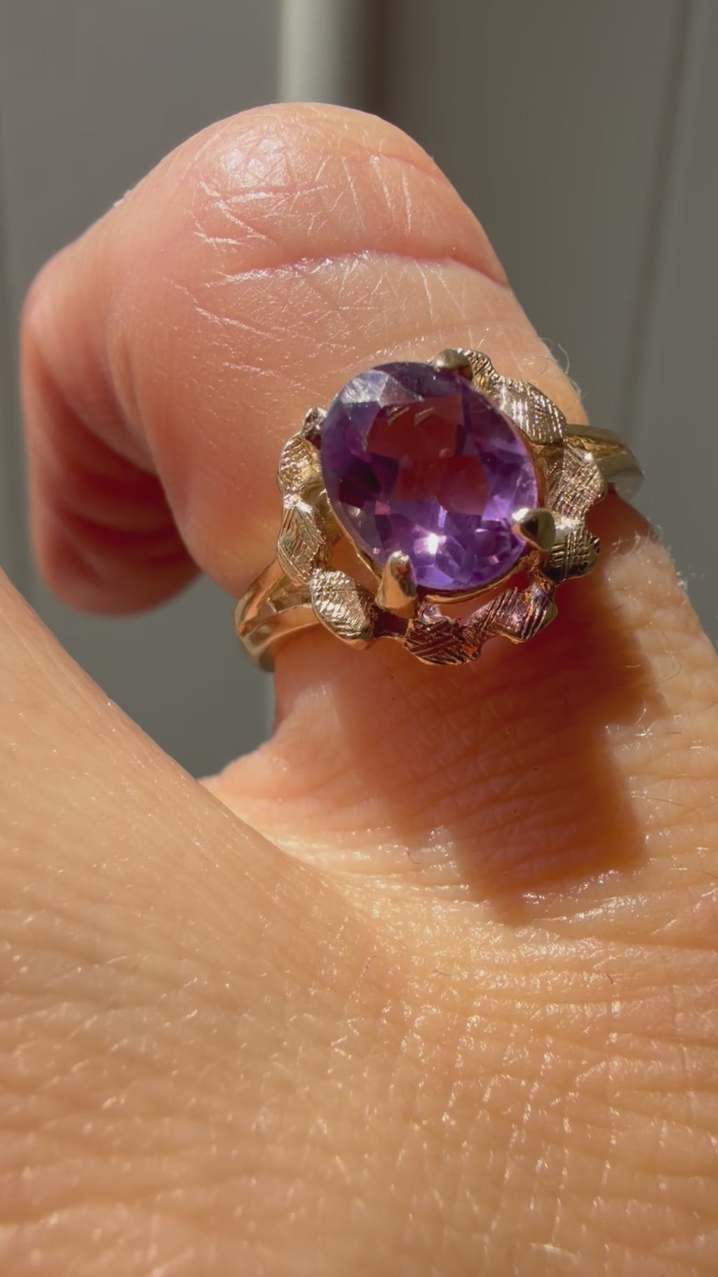 oval amethyst with florentine halo ring