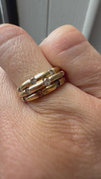triple gold band with spaced diamonds