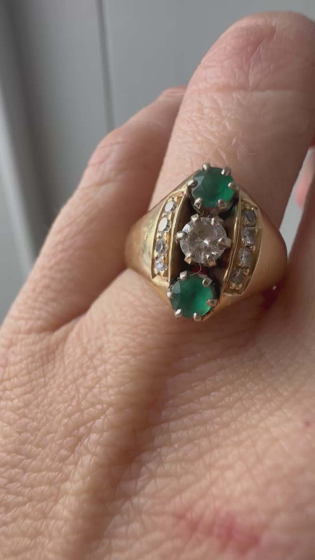 emerald and diamond navette style ring