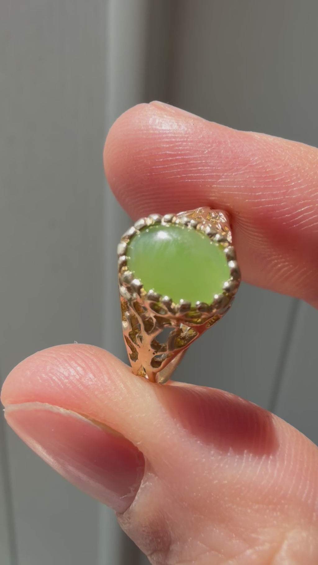 open work bezel set oval jade