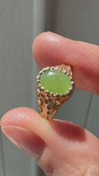 open work bezel set oval jade
