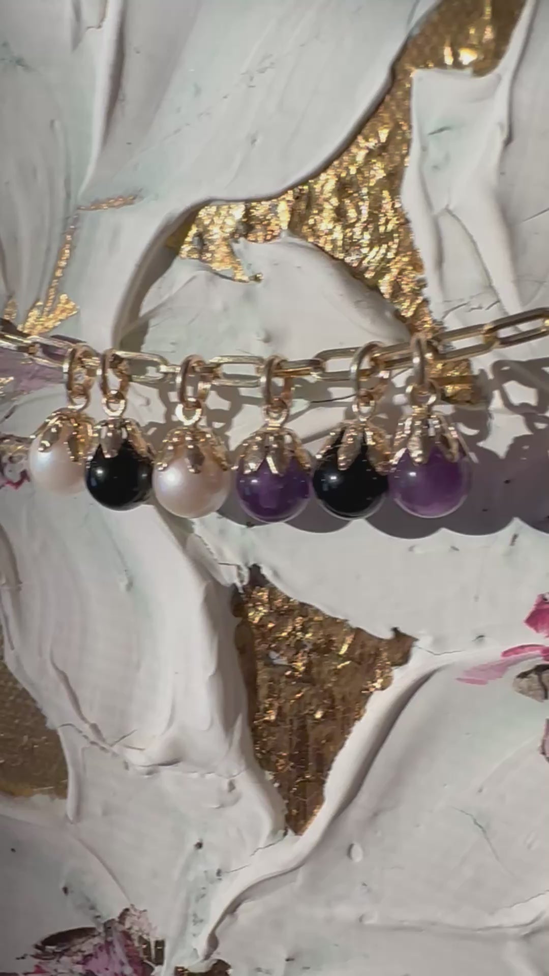 pearl, onyx and amethyst cabochon baubles