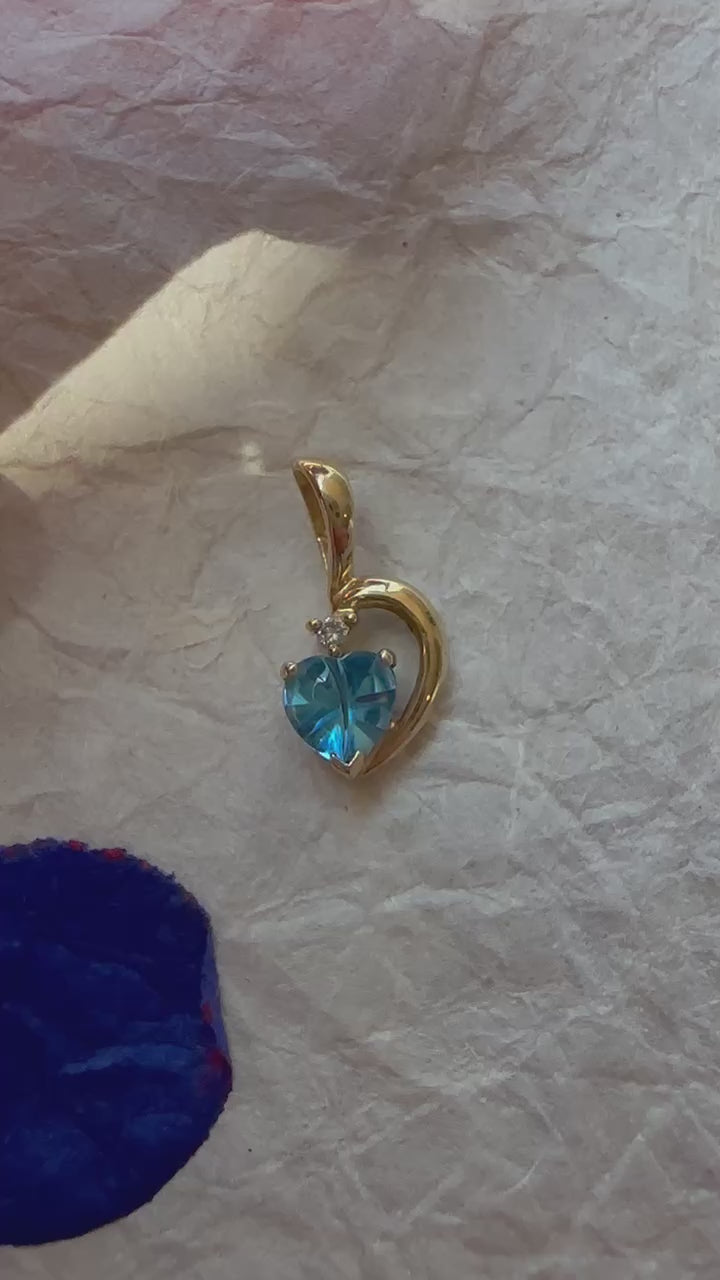 Bright Blue Topaz Swirl Pendant