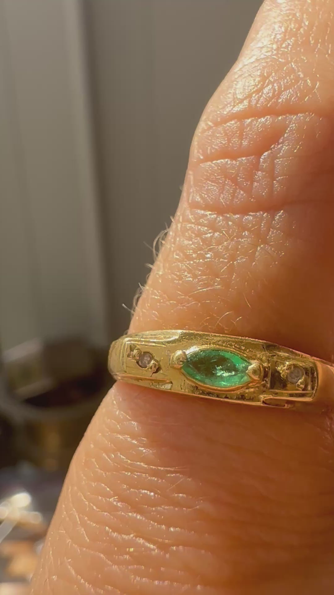 east west marquise emerald in 18k gold
