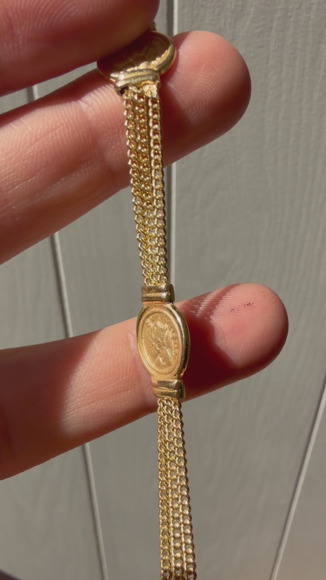 double sided coin and curb chain bracelet