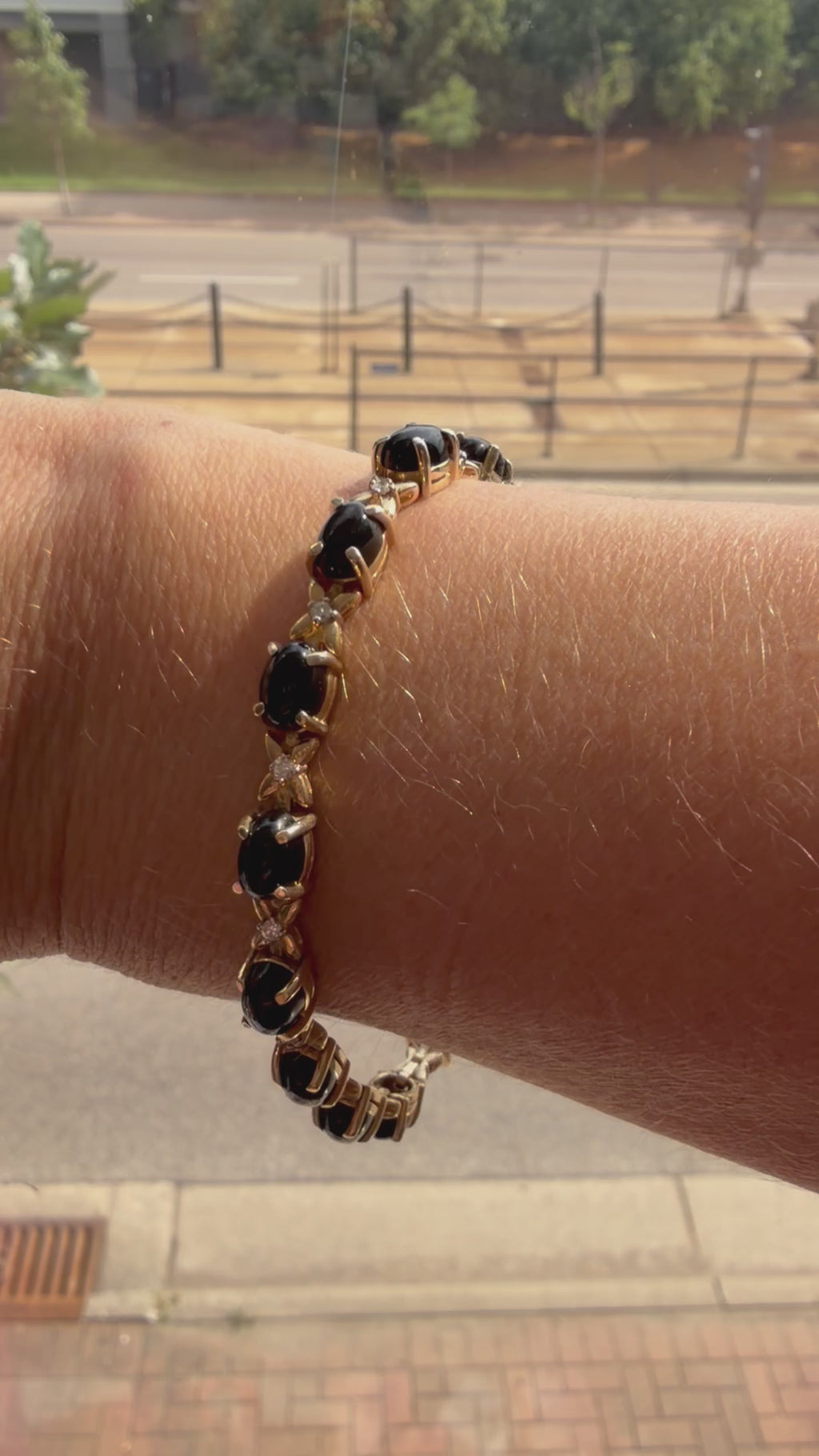 onyx cabochon and diamond tennis bracelet