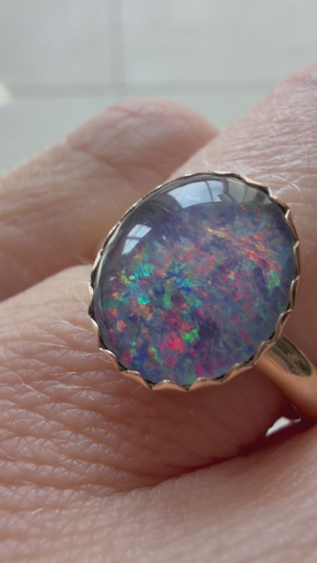 mesmorizing Opal with spiky bezel
