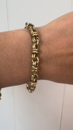 high karat knot bracelet with hidden clasp