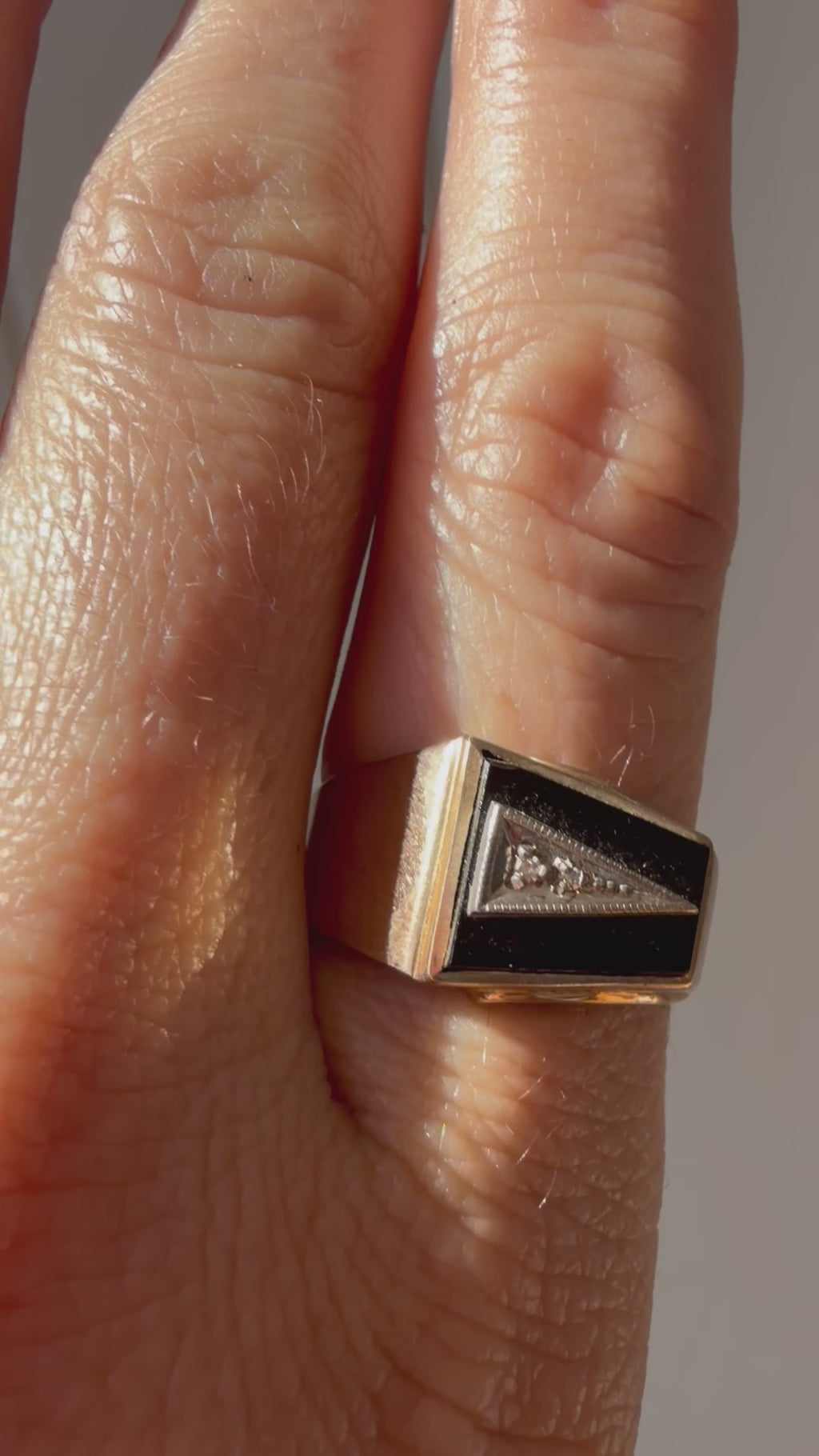 onyx and gold arrow ring